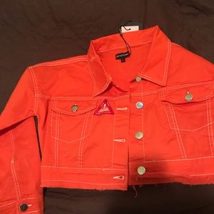 bright orange denim jacket
